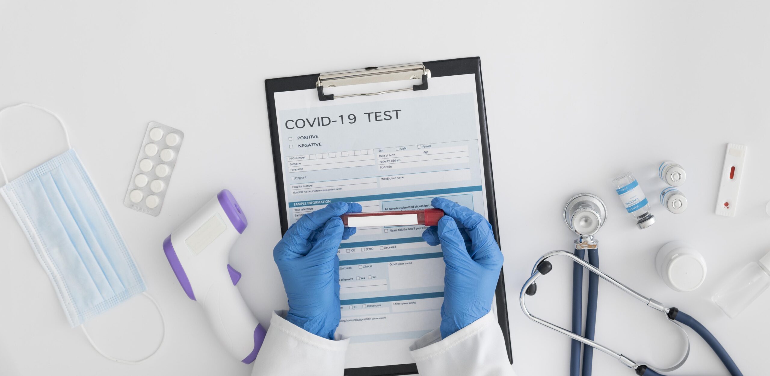 top-view-doctor-checking-covid-test-scaled.jpg